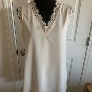Cream sleeveless polyester blouse with lace and fringe detail size XL